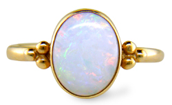 Opal ring crafted in 14kt gold; finger size 5. (J1124)